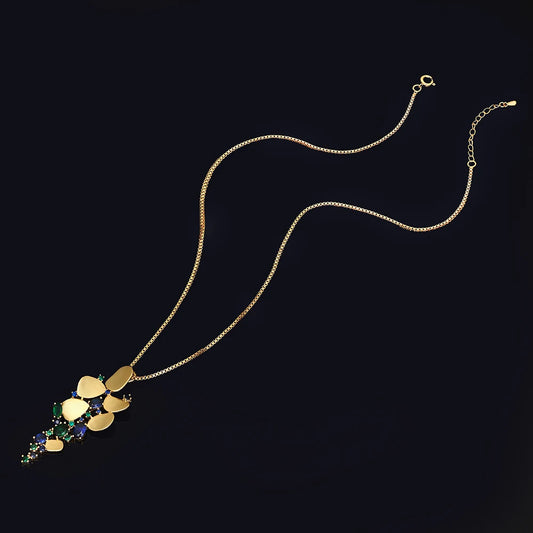 Gold-plated necklace and pendant set with cubic zirconia.